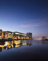 Buildings by river at sunset in Malmo, Sweden - FOLF11752