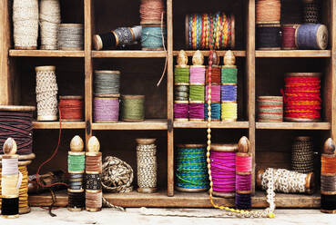 Spools of thread and ribbon on shelves - FOLF11822