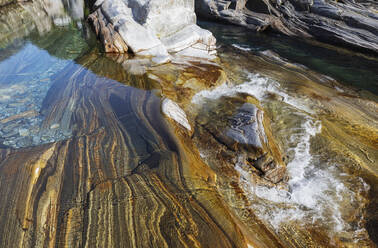 Switzerland, Ticino, Lavertezzo, Clear surface of Verzasca river - GWF07502