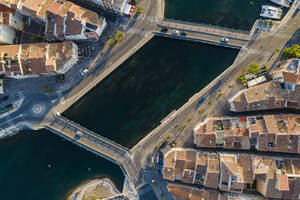 Aerial view of bridges crossing the river in Martigues at sunset, Provence, France. - AAEF14870