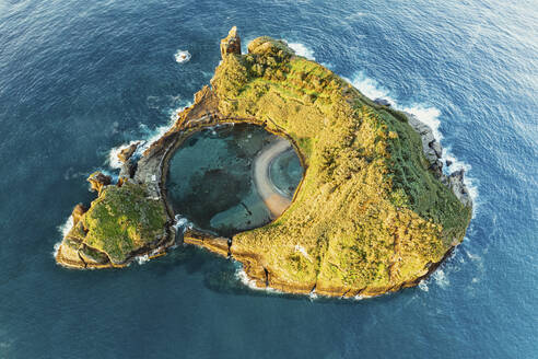 Aerial view of the small, volcanic island Vila Franco do Compa at sunrise, Sao Miguel, Azores, Portugal. - AAEF14929