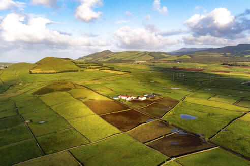 Aerial view of the volcanic island Terceira with fields and houses, Azores, Portugal. - AAEF14945