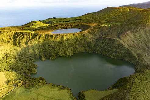 Aerial view of crater lakes Rasa and Funda at sunrise, Flores, Azores, Portugal. - AAEF14957