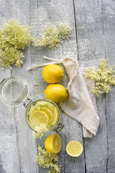 Studio shot of elderflower syrup in mason jar - ASF06834