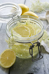 Studio shot of elderflower syrup in mason jar - ASF06835