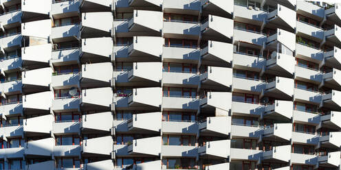 Germany, North Rhine-Westphalia, Cologne, Panoramic view of rows of apartment balconies - WGF01414