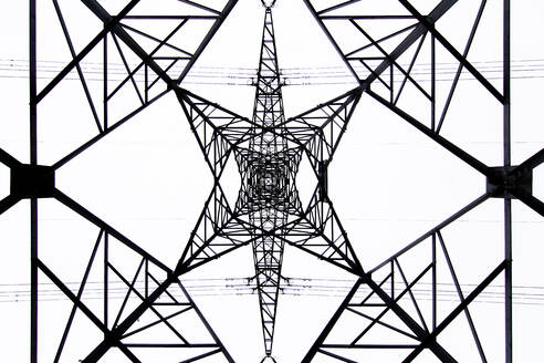 From below black and white close up of energy tower creating abstract background geometric shapes - ADSF36098