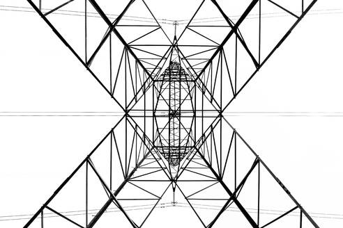 From below black and white close up of energy tower creating abstract background geometric shapes - ADSF36099