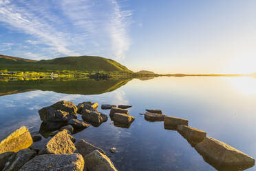 Norway, Nordland, Coastline of Vestvagoya island at sunset - STSF03377