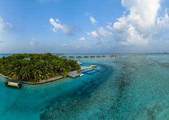 Maldives, North Male Atoll, Lankanfushi, Aerial view of tourist resort on small tropical island - AMF09559