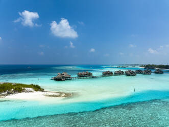 Maldives, North Male Atoll, Lankanfushi, Aerial view of bungalows of tropical tourist resort - AMF09563