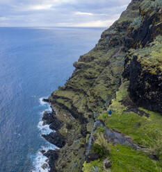 Aerial View of terrace fields on the slopes of the cliff overlooking the ocean, Santo Espirito, Azores, Portugal. - AAEF15223