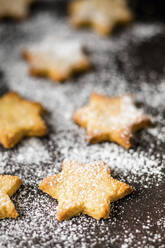 Studio shot of star shaped cookies with powdered sugar - SBDF04563