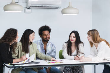 Business team having a meeting in office - PNAF04451