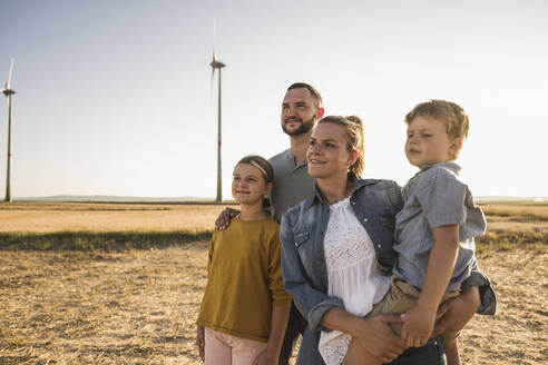 Confident family looking at distance - UUF27139