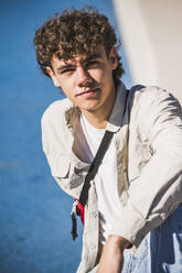 Smiling young man with brown hair - UUF27179