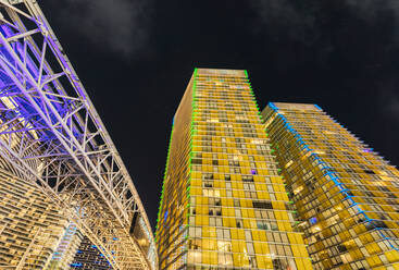 Low angle view of illuminated modern skyscrapers in Las Vegas at night - ADSF36805