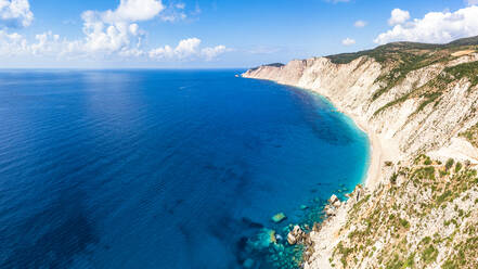 Fine sand of Ammos beach and cliffs washed by the crystal turquoise sea, overhead view, Kefalonia, Ionian Islands, Greek Islands, Greece, Europe - RHPLF22854