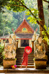 Woman at Wat Pha Lat, Chiang Mai, Thailand, Southeast Asia, Asia - RHPLF23061