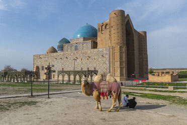 Bactrian camel in front of the Mausoleum of Khoja Ahmed Yasawi, UNESCO World Heritage Site, Turkistan, Kazakhstan, Central Asia, Asia - RHPLF23149