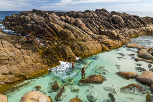 Aerial view of people at Injidup natural Spa along the coast, Yallingup, Western Australia, Australia. - AAEF15672