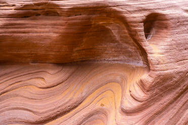 Uneven surface of dry wall of Buckskin Gulch Canyon on sunny day in Utah, USA - ADSF37453