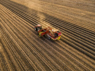 Combine harvester harvesting in field - NOF00630