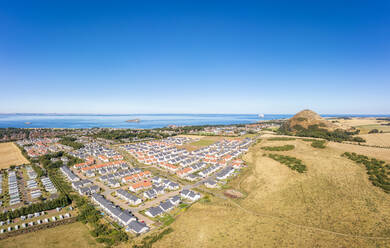 UK, Scotland, North Berwick, Aerial view of houses of coastal town in summer - SMAF02179