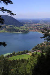 Germany, Bavaria, Schliersee, View of lake Schliersee and surrounding town in summer - JTF02206