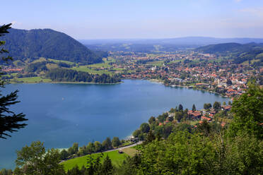 Germany, Bavaria, Schliersee, View of lake Schliersee and surrounding town in summer - JTF02208