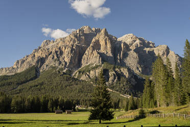 Majestic rock mountains at Dolomites on sunny day, Italy - JCCMF07336