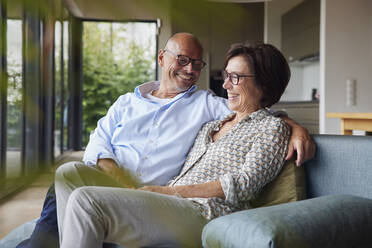 Happy senior couple spending time together at home - RBF08951