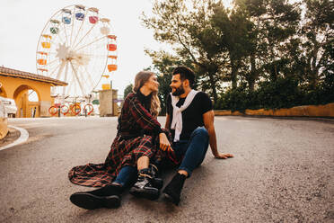Couple on a date in a funfair in Barcelona, Spain - ADSF39229