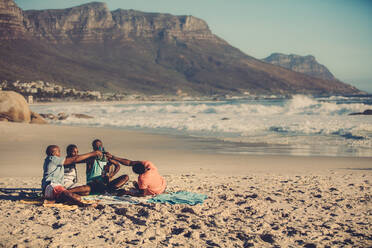 Portrait of group of friends playing guitar and drinking beer. People on the beach having a party. - JLPSF00063