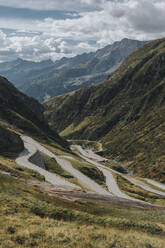 Winding roads at Gotthard Pass on sunny day - DMGF00872