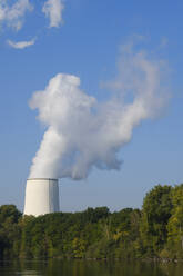 Germany, North Rhine-Westphalia, Bergkamen, Datteln-Hamm Canal with smoke rising from cooling tower of coal-fired power station in background - WIF04593