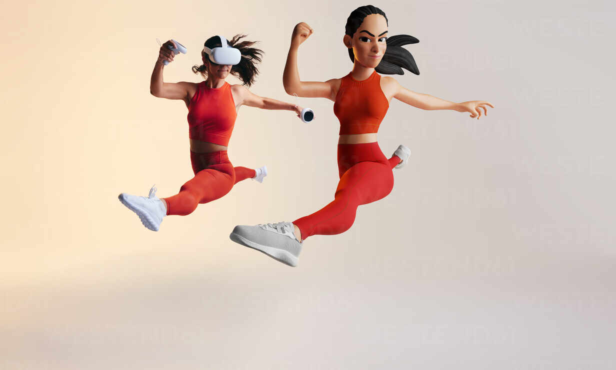 Metaverse workout session. Sporty young woman exploring virtual reality  fitness games as a 3D avatar. Athletic young woman running with virtual  reality goggles and controllers. stock photo