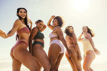 Females in Thongs on the Beach. Stock Photo - Image of season