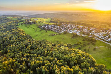 Germany, Baden-Wurttemberg, Drone view of town in Rems Valley at sunset - STSF03547