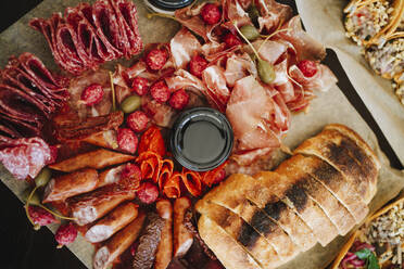 Platter of smoked sausages, salami and baguette - MDOF00010