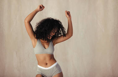 Dancing Woman in Underwear from Behind Stock Photo - Image of thin
