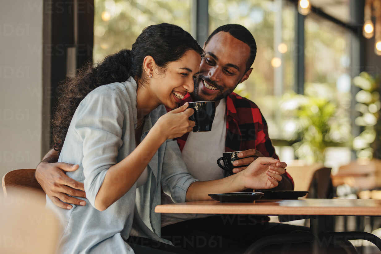 Cute couple having coffee in a luxury hotel room – Jacob Lund Photography  Store- premium stock photo