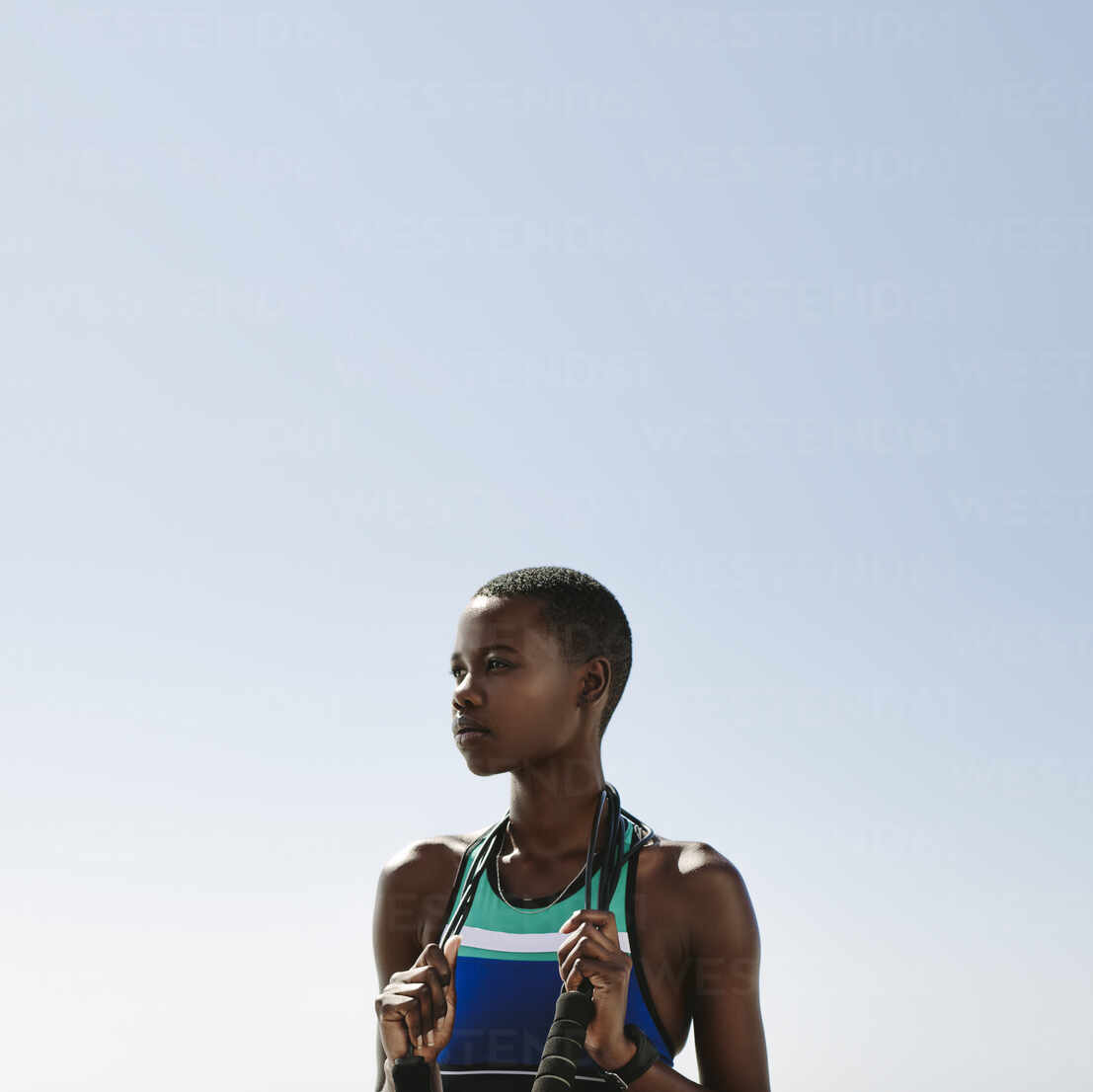 Sportswoman with a skipping rope at the park – Jacob Lund