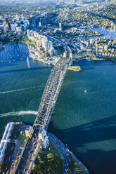 View from above of the Sydney Harbour Bridge and the city of Sydney, downtown and waterfront. - MINF16589