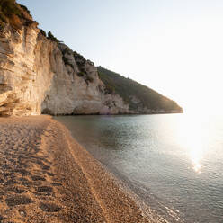 Italy, Apulia, Gargano, Baia Delle Zagare, Cliff and beach on coast of Adriatic Sea - TETF01849