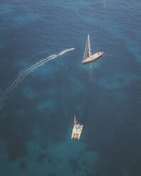 Aerial view of a sailboat, Port Andratx, Mallorca, Spain. - AAEF16055