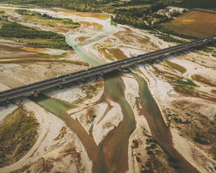 Aerial view of a bridge over the Piave river, Italy. - AAEF16219