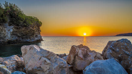View of coastal boulders at sunrise - MHF00660