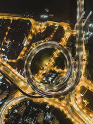 Aerial view of Nanpu bridge intersection in Shanghai at night. - AAEF16432