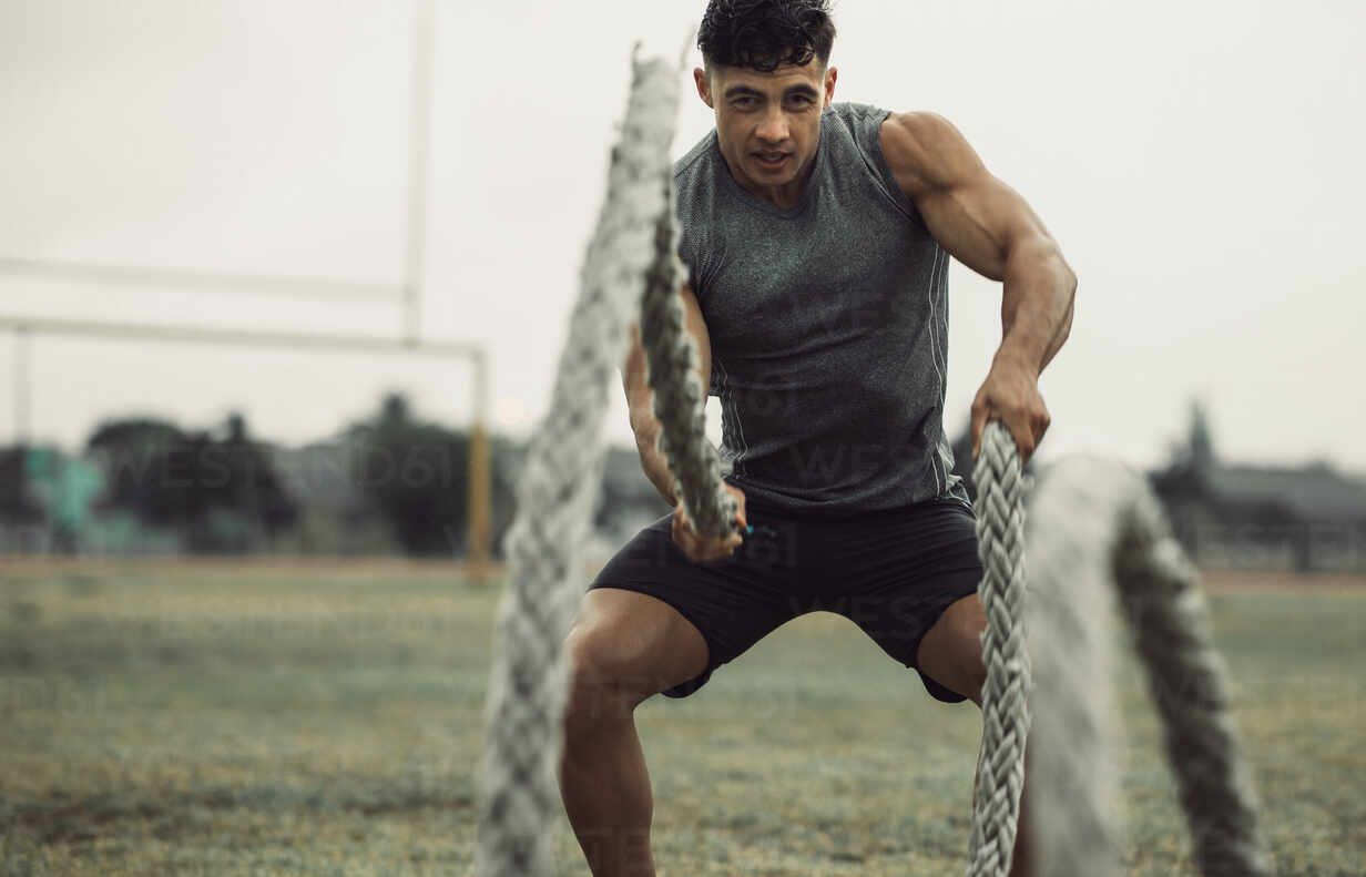 Athlete working out with battle ropes – Jacob Lund Photography, battle rope